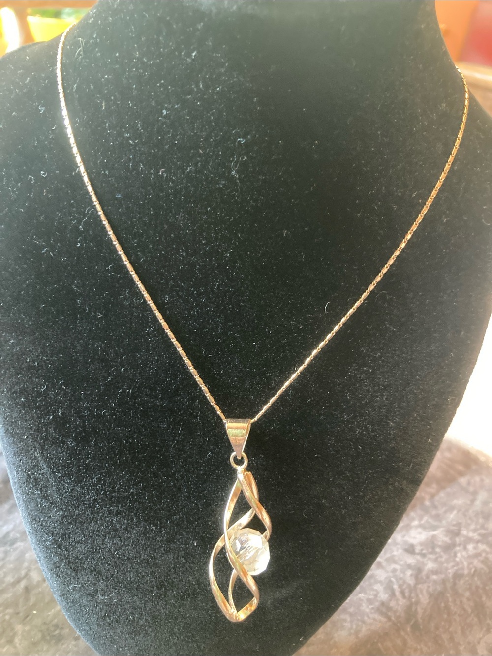 Gold-Tone Twisted Pendant Necklace with Clear Faceted Bead Center